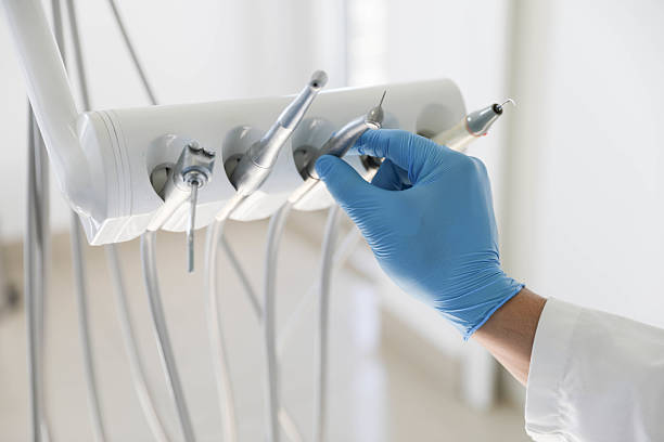 Professional Tooth Extraction technician working in Argyle, TX